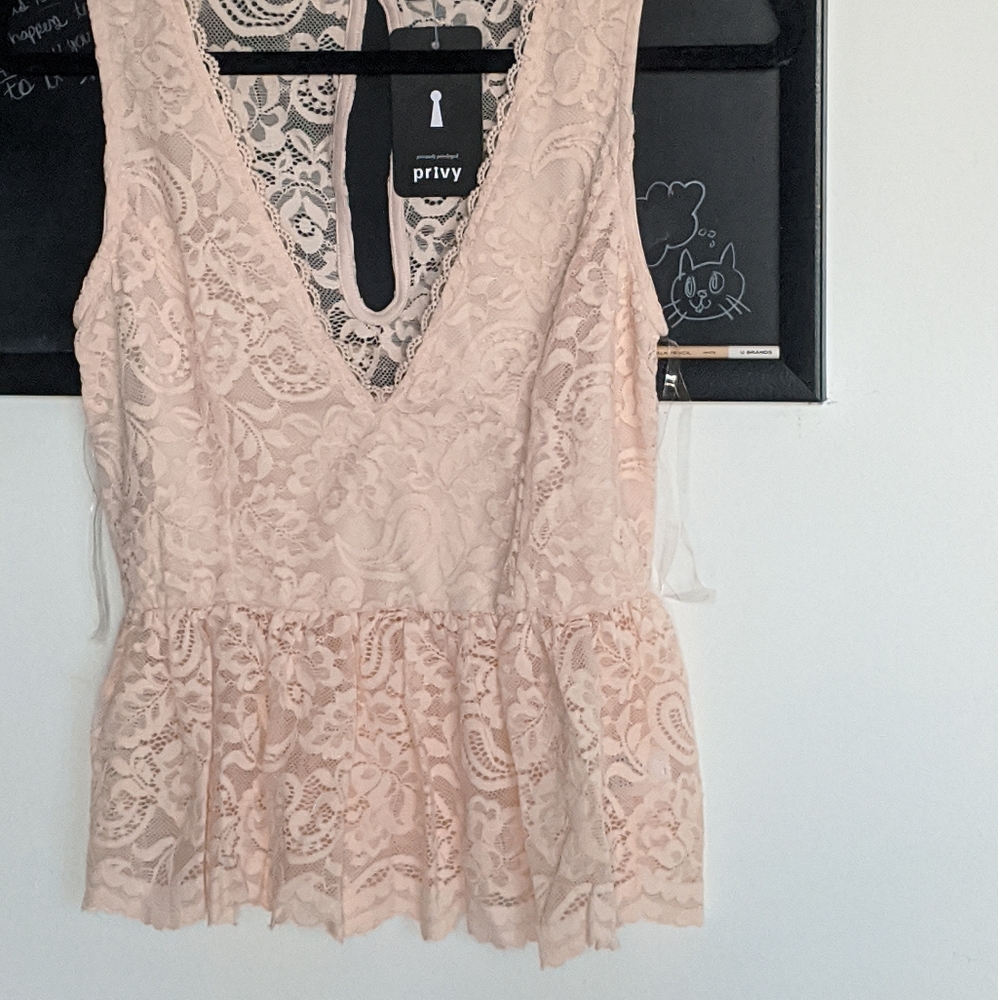 Light pink lace cutout top